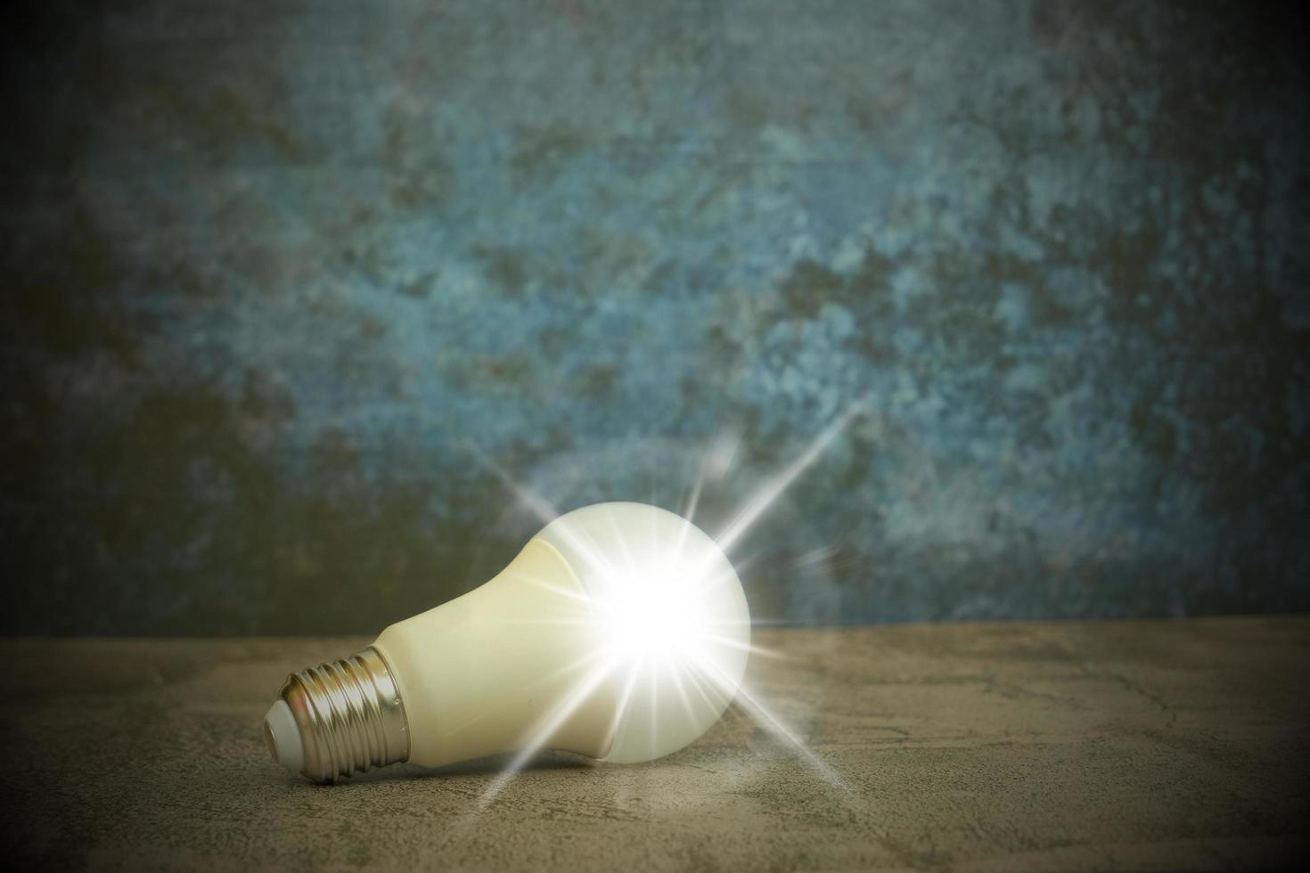 Light bulb, demonstrating a novel idea. Concepts for solutions, brainstorming, and inspiration photo