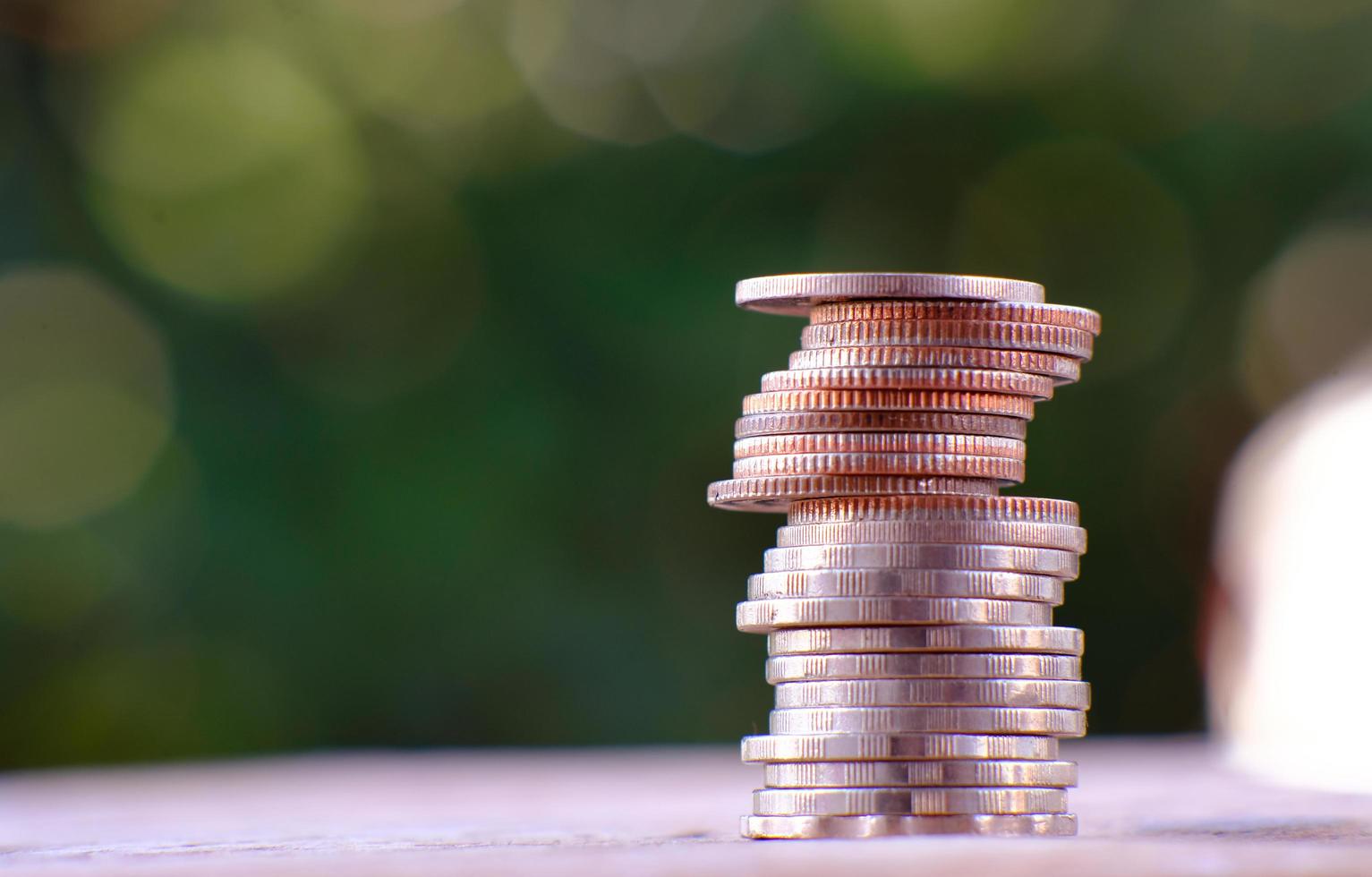 Coin on table background and business or finance saving money, Coins and business growth concept, finance and investment concept, Advertising coins of finance and banking photo