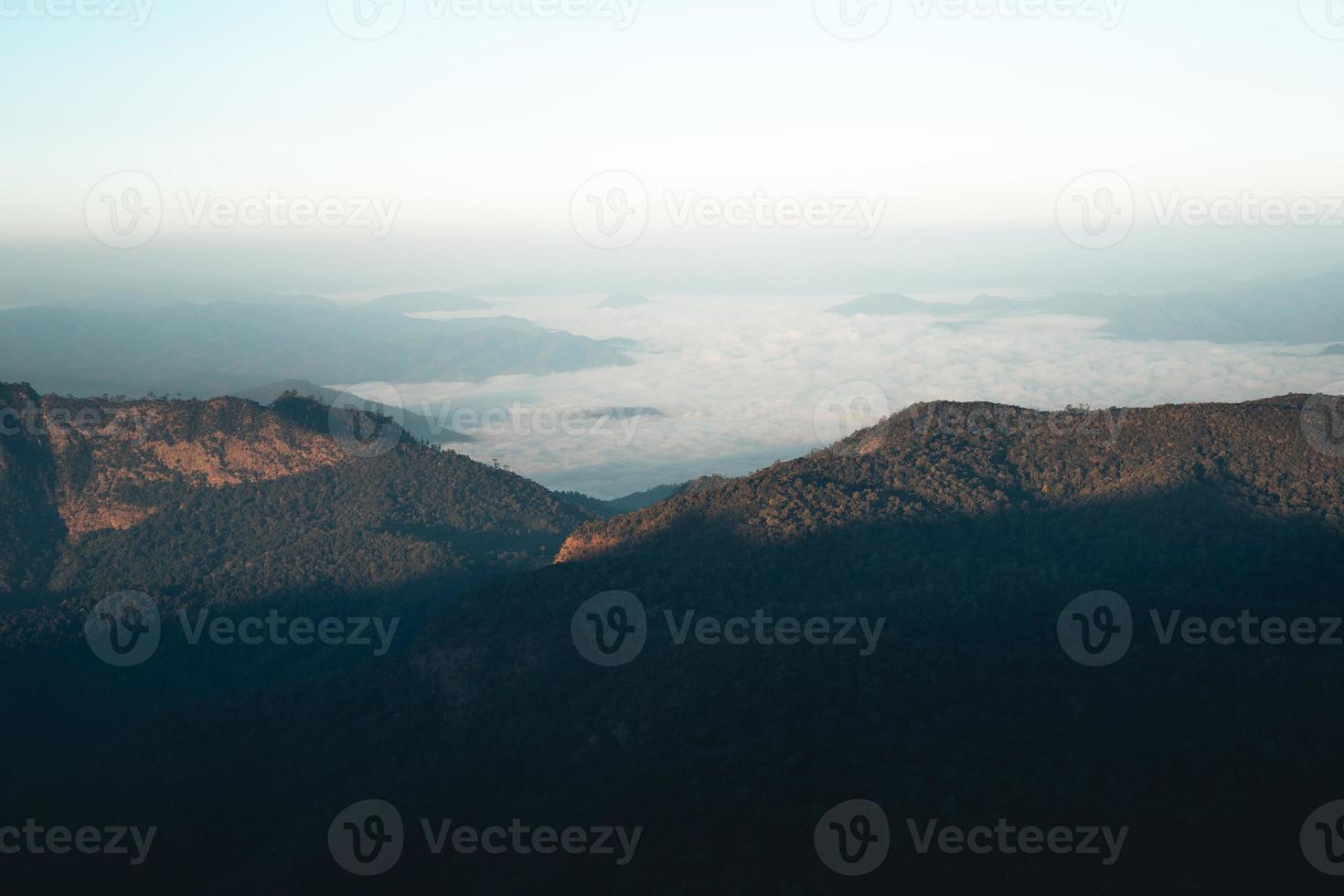 morning light and mountains,mountains in summer morning and spring flowers photo