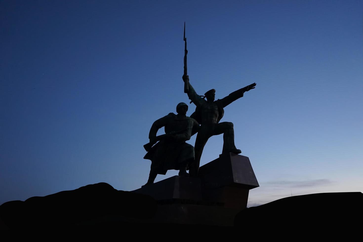 Sevastopol, Crimea-March 16, 2015 -Monument to soldier and sailor on the background of the evening sky photo
