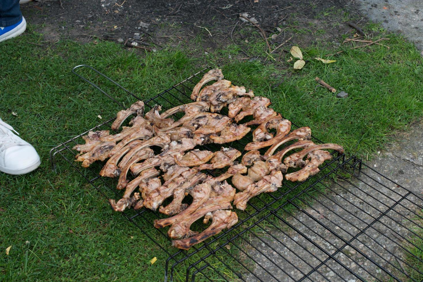 Delicious lamb chops ready to eat. Out of the barbacue, in a cooking grid photo