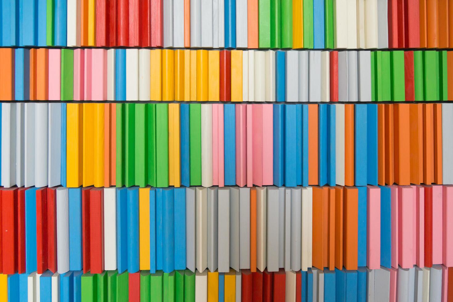 Colorful background. Wooden blocks on shelves, different colors and shapes. photo