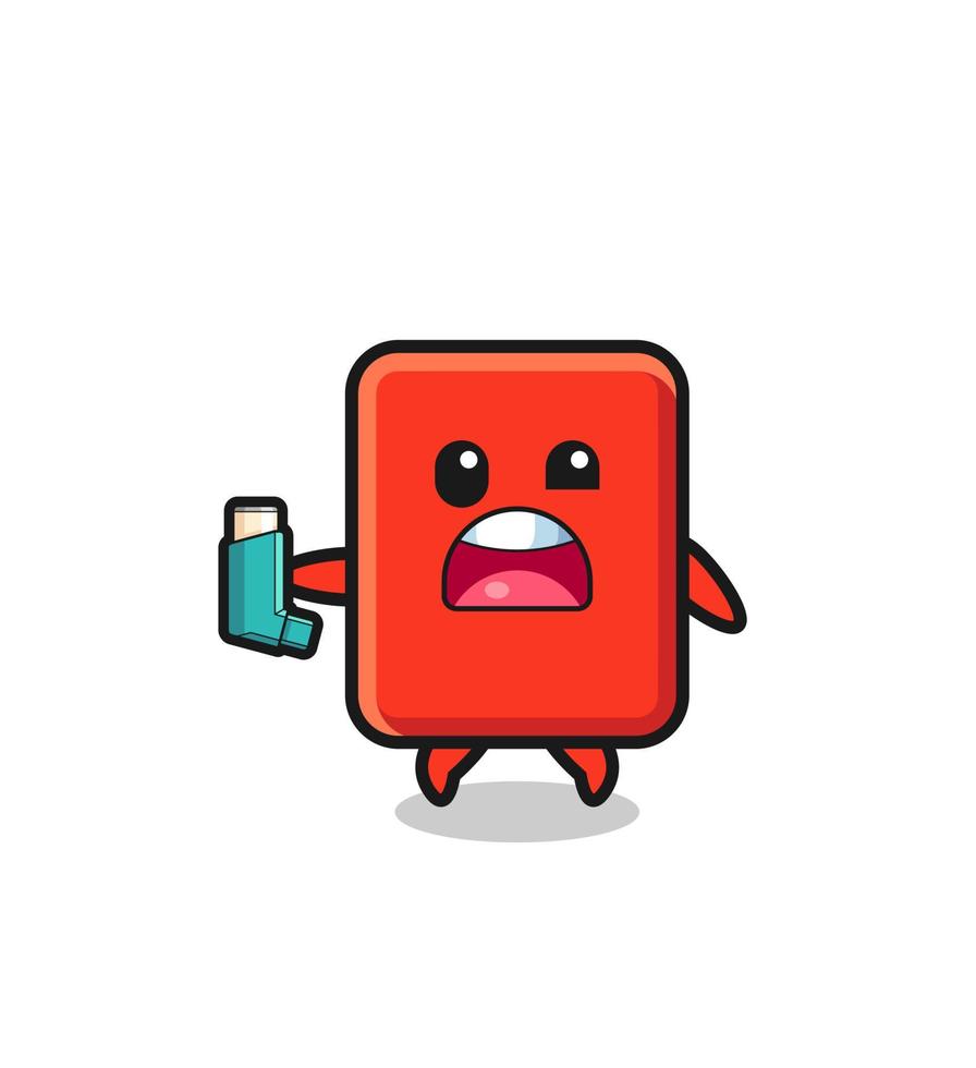 red card mascot having asthma while holding the inhaler vector