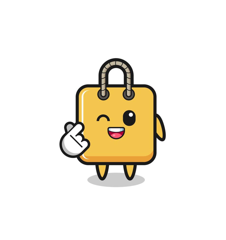 personaje de bolsa de compras haciendo corazón de dedo coreano vector