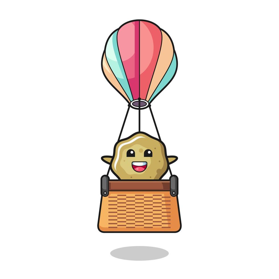 loose stools mascot riding a hot air balloon vector