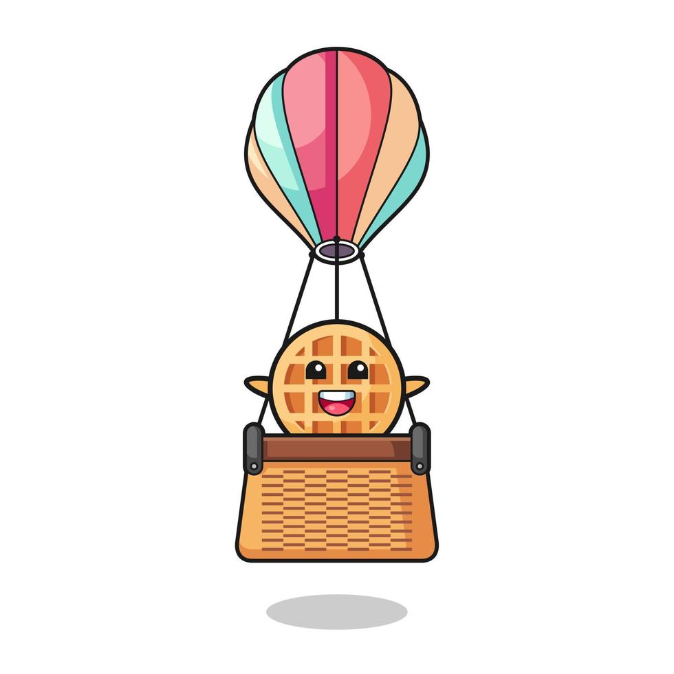 mascota de waffle circular montando un globo aerostático vector