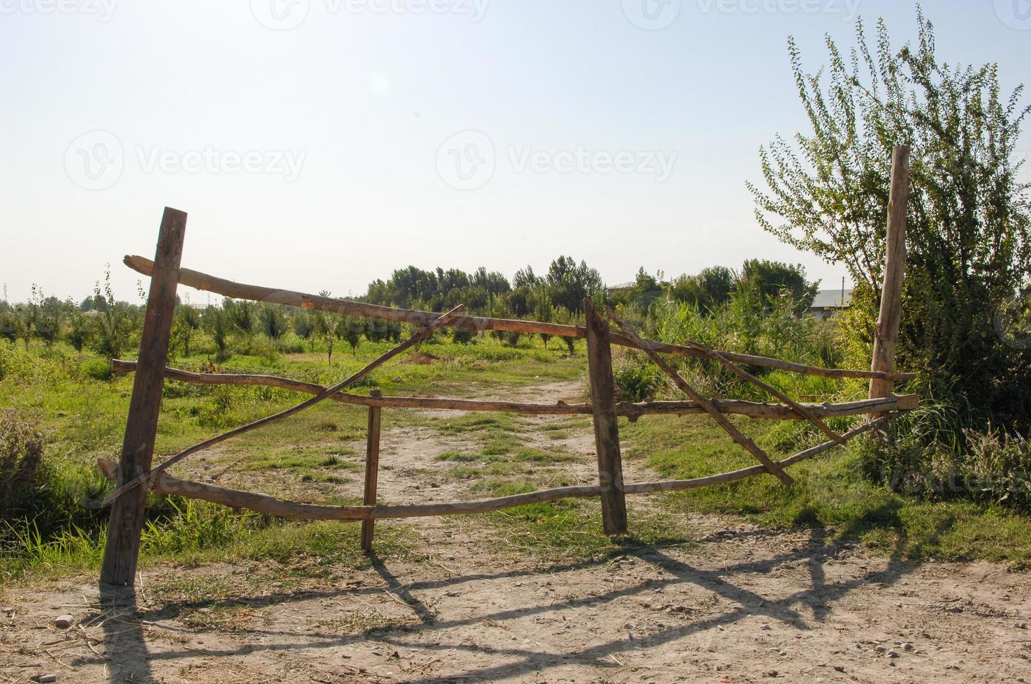 old abandoned wooden fence on the farm photo