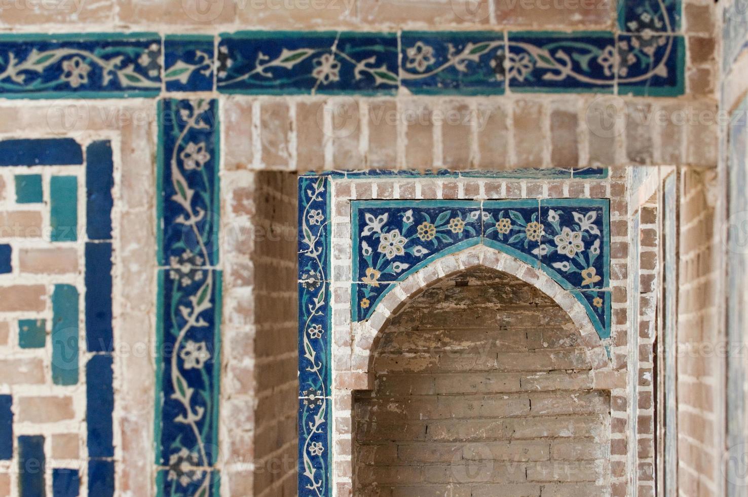 Dome in the form of an arch in traditional Asian mosaic. Details of the architecture of medieval Central Asia photo