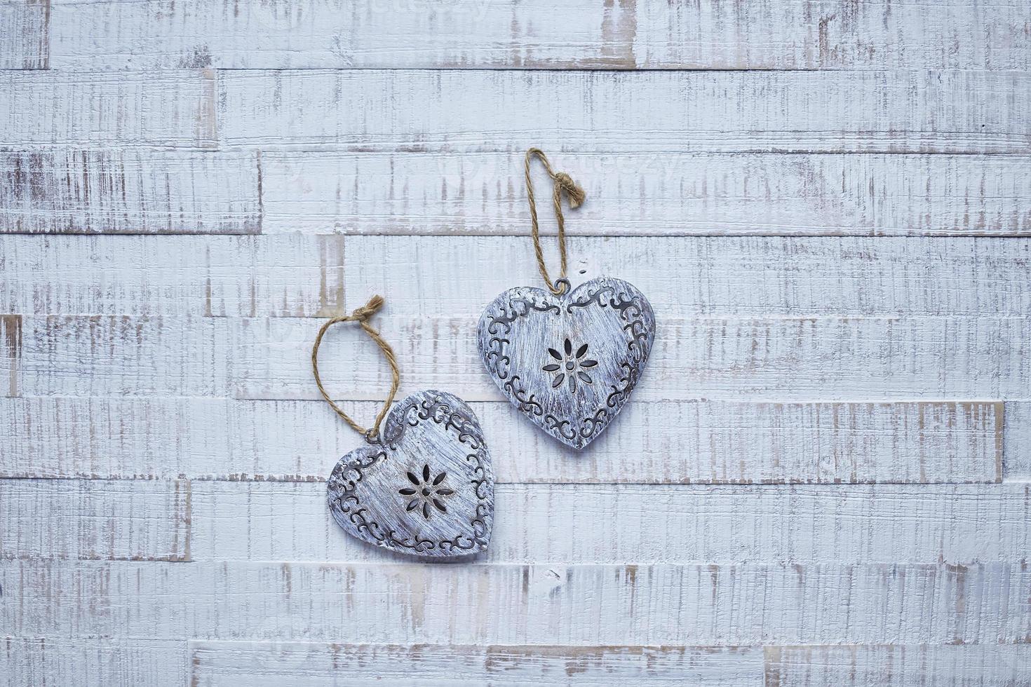 Valentine's Day Abstract Background with Painted  Metal Hearts Shape photo