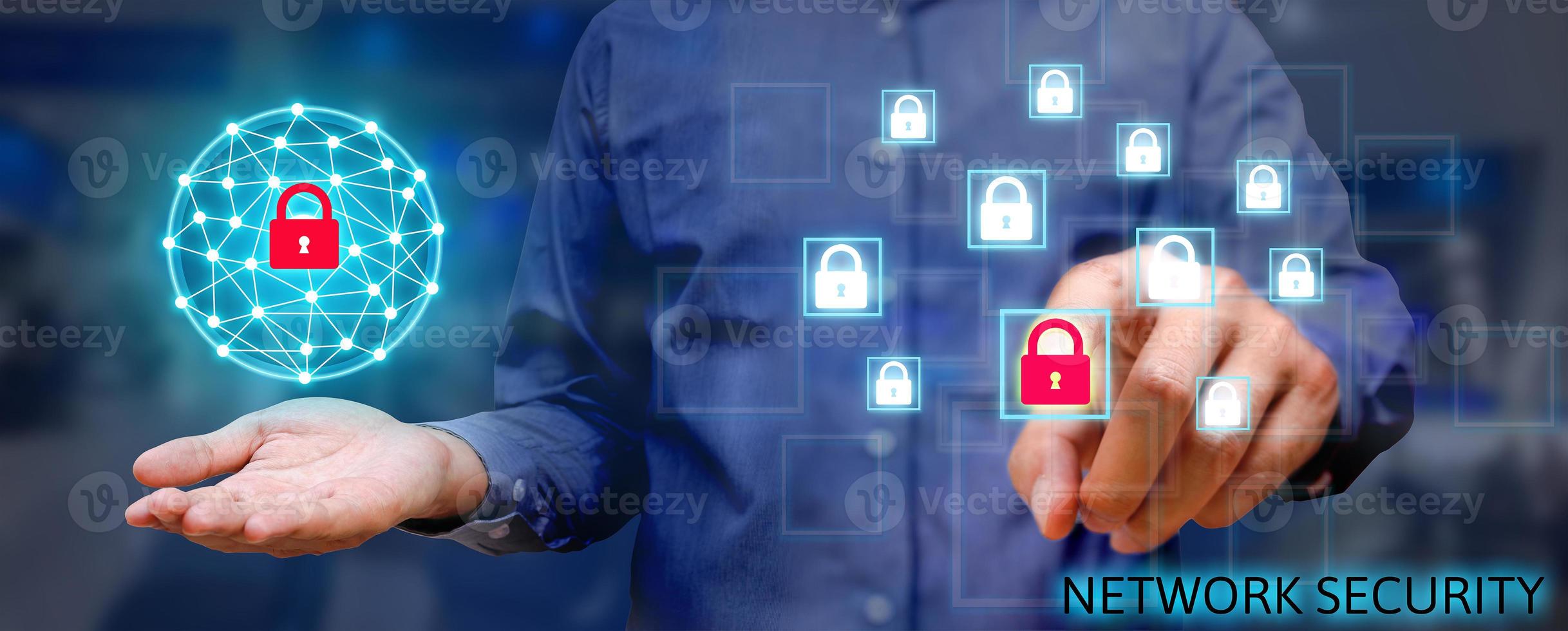 Cyber security network concept, Young asian man holding global network security and pressing lock icon with virtual screen. photo