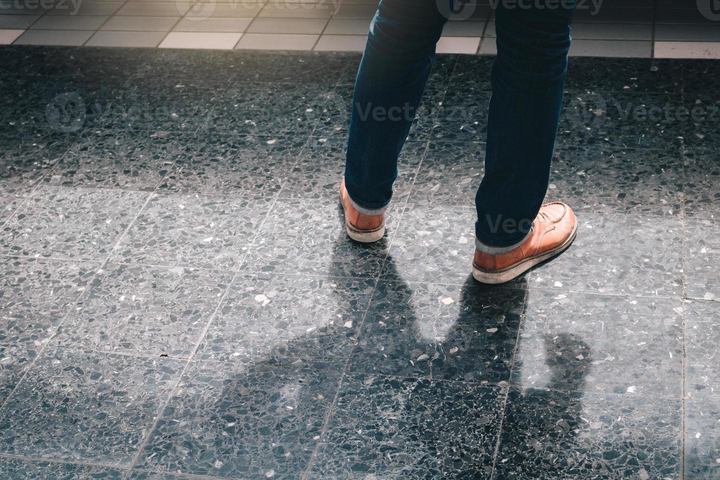 Young traveler asian man standing on platform waiting in train. photo