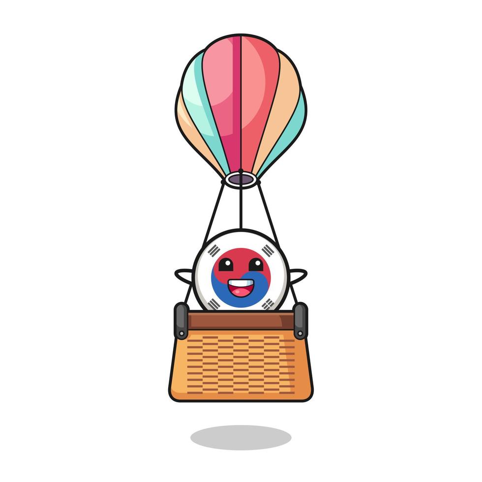south korea flag mascot riding a hot air balloon vector