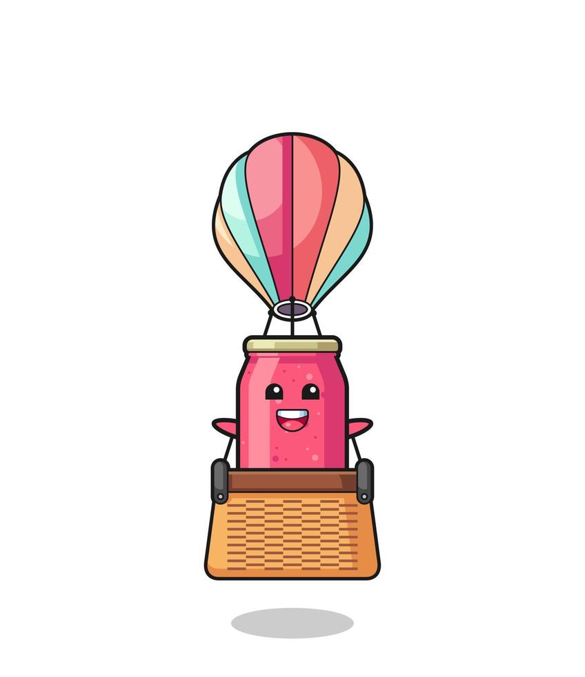 mascota de mermelada de fresa montando un globo aerostático vector
