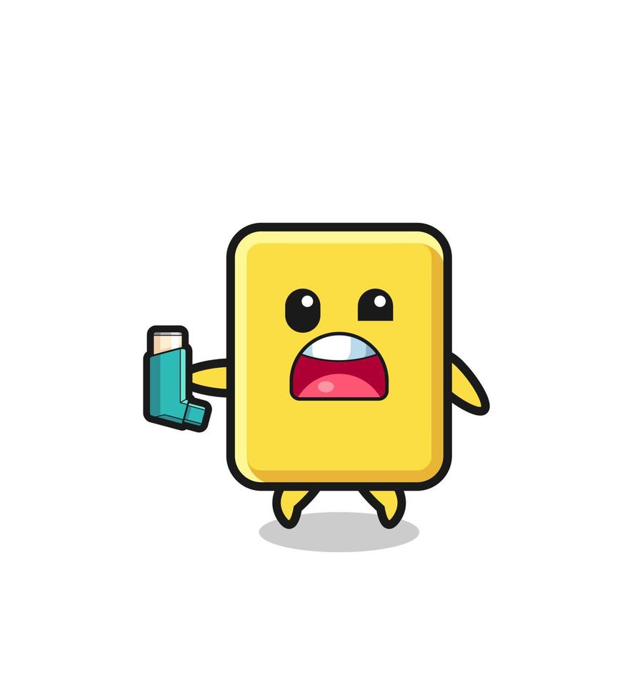 yellow card mascot having asthma while holding the inhaler vector