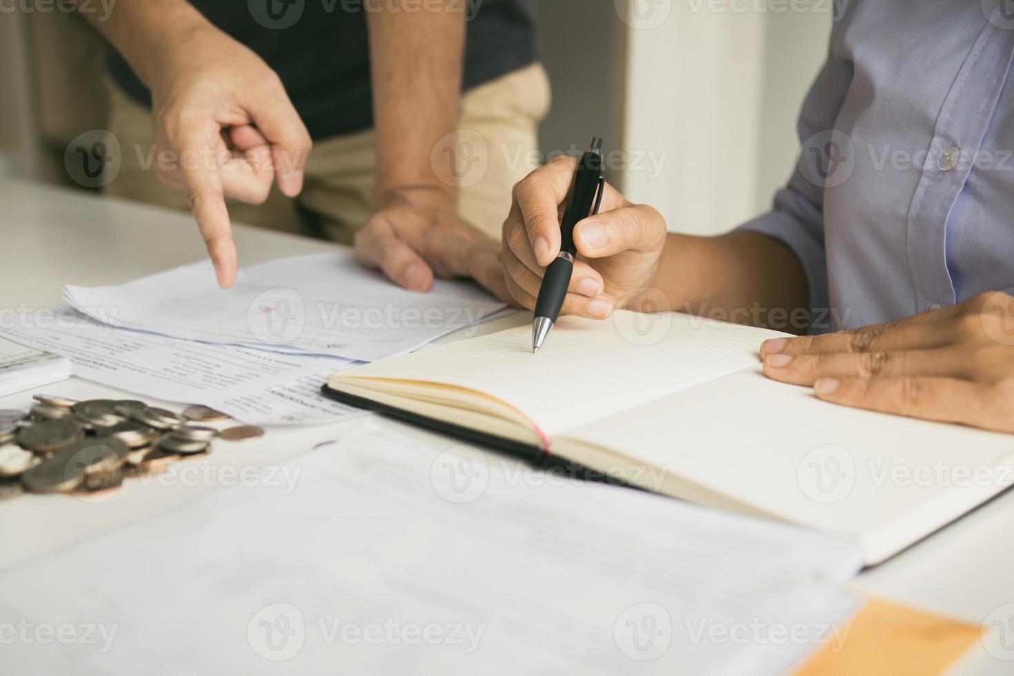 Two asian couples and men and women are together analyzing expenses or finances in deposit accounts and daily income sources with an savings economical concept. photo