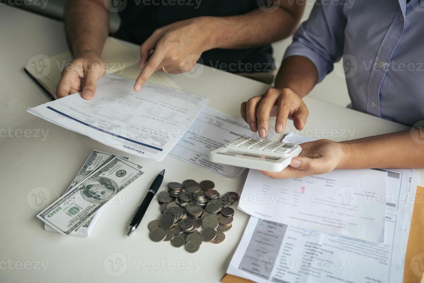 Two asian couples and men and women are together analyzing expenses or finances in deposit accounts and daily income sources with an savings economical concept. photo