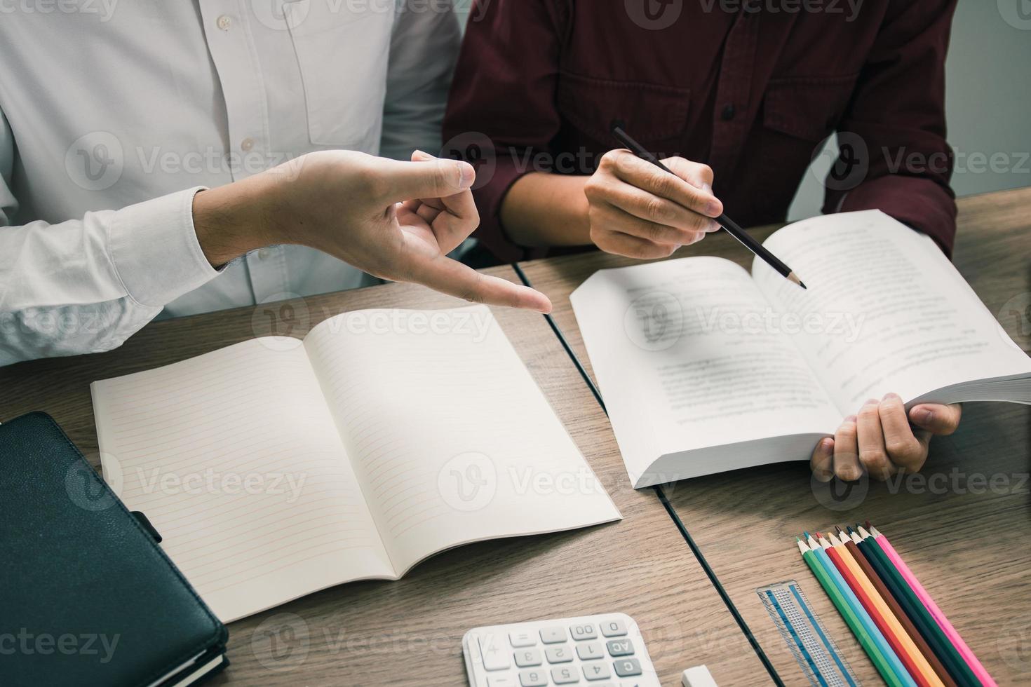 Students studying in the classroom during the lecture. photo