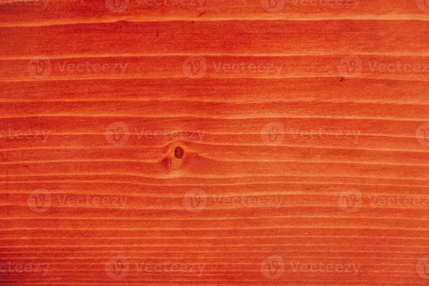 Red natural wood as a background texture photo