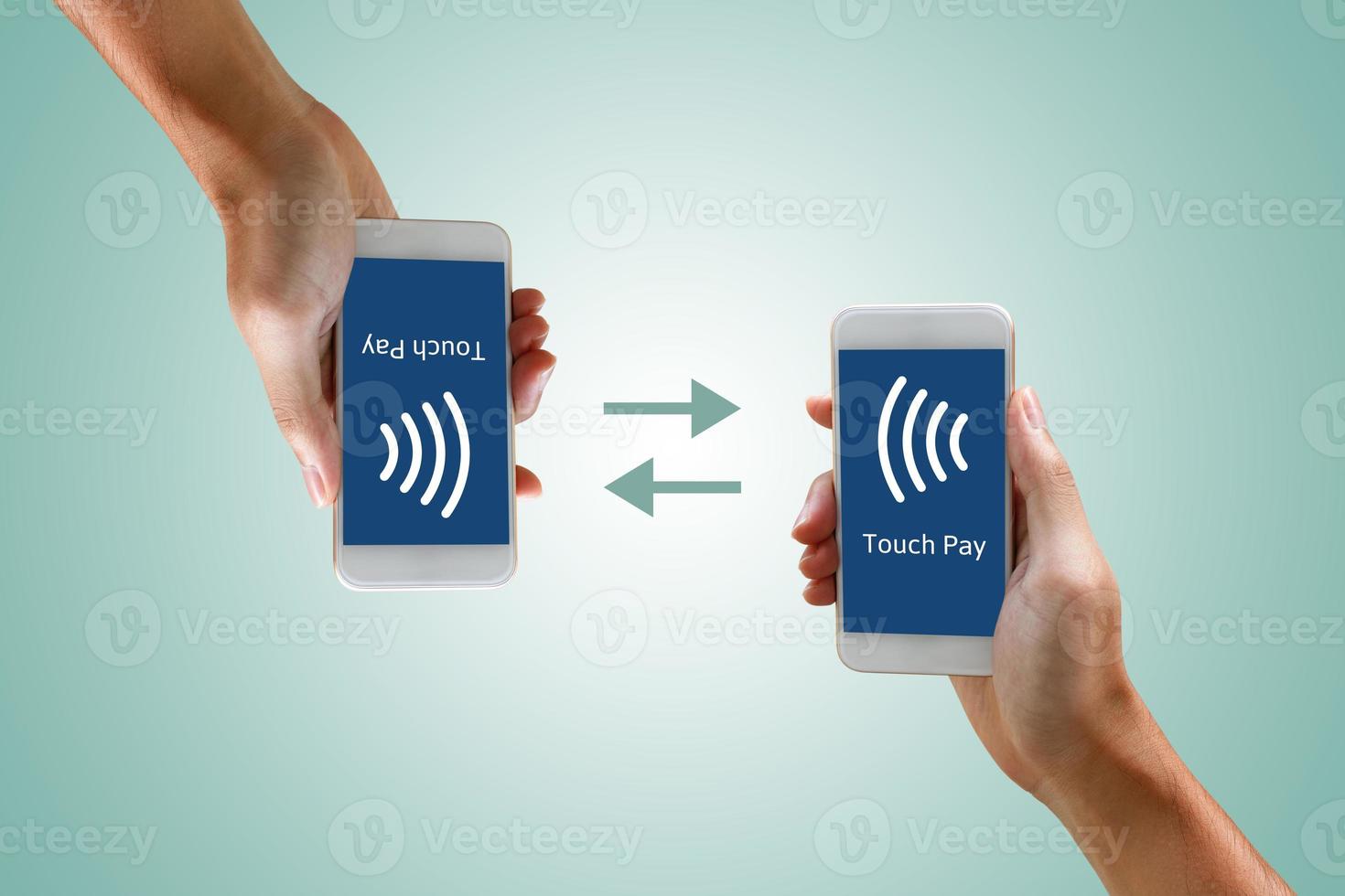 Mobile payments with smartphone concept. Woman holding phone and paying by touch. photo