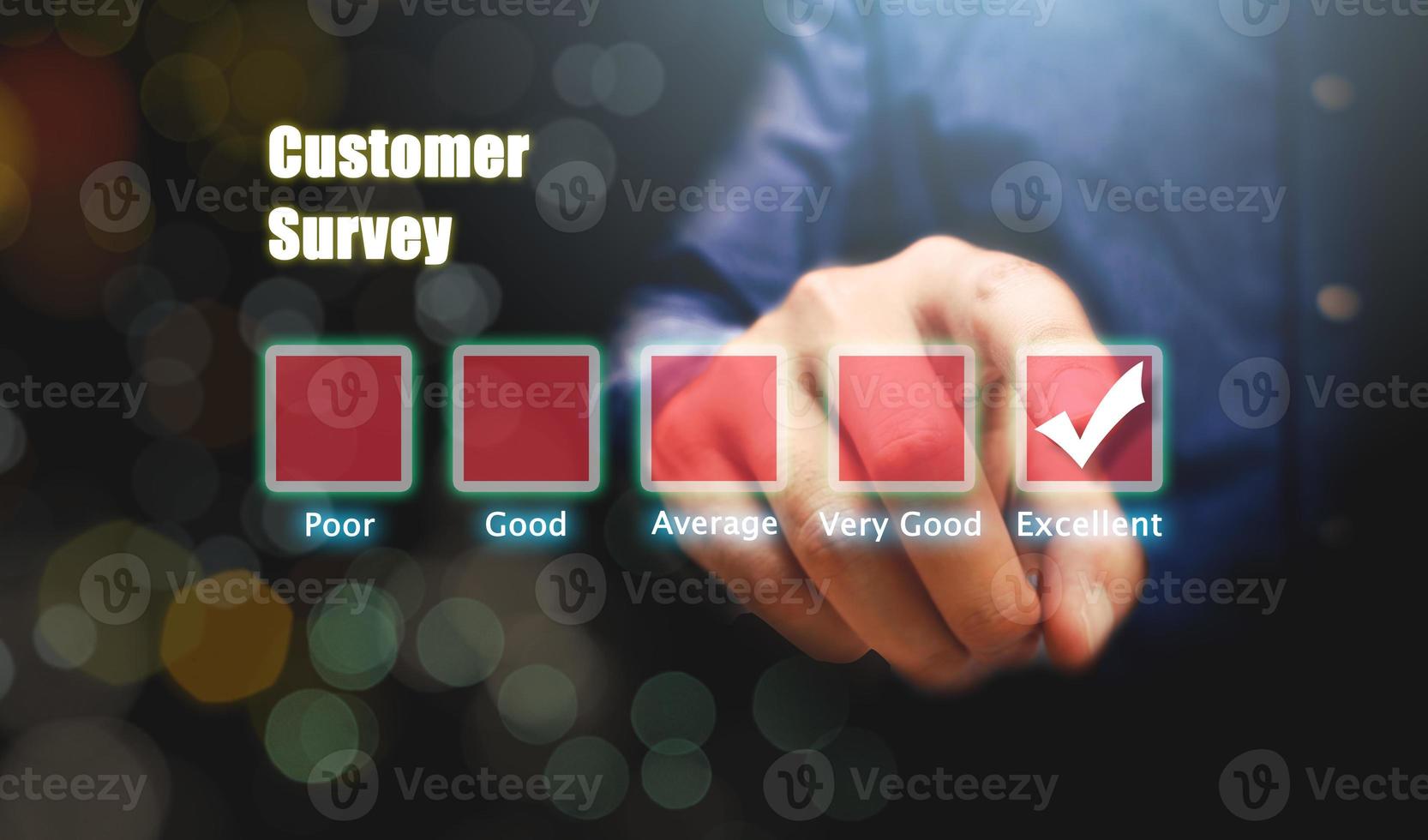 Human hand pointing on excellent box with customer survey concept. photo