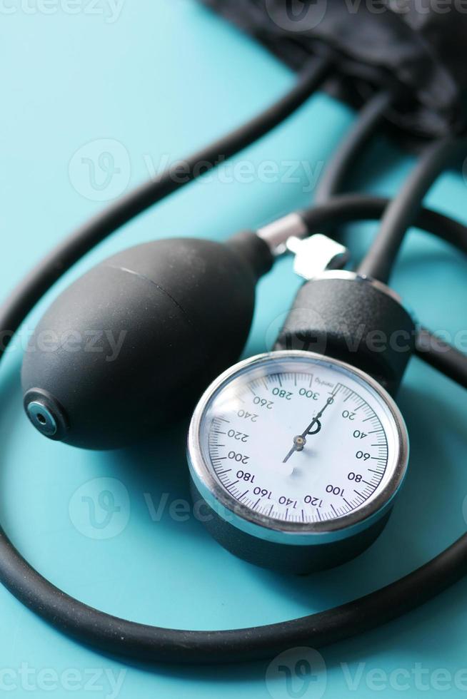 detail shot of blood pressure machine on table photo