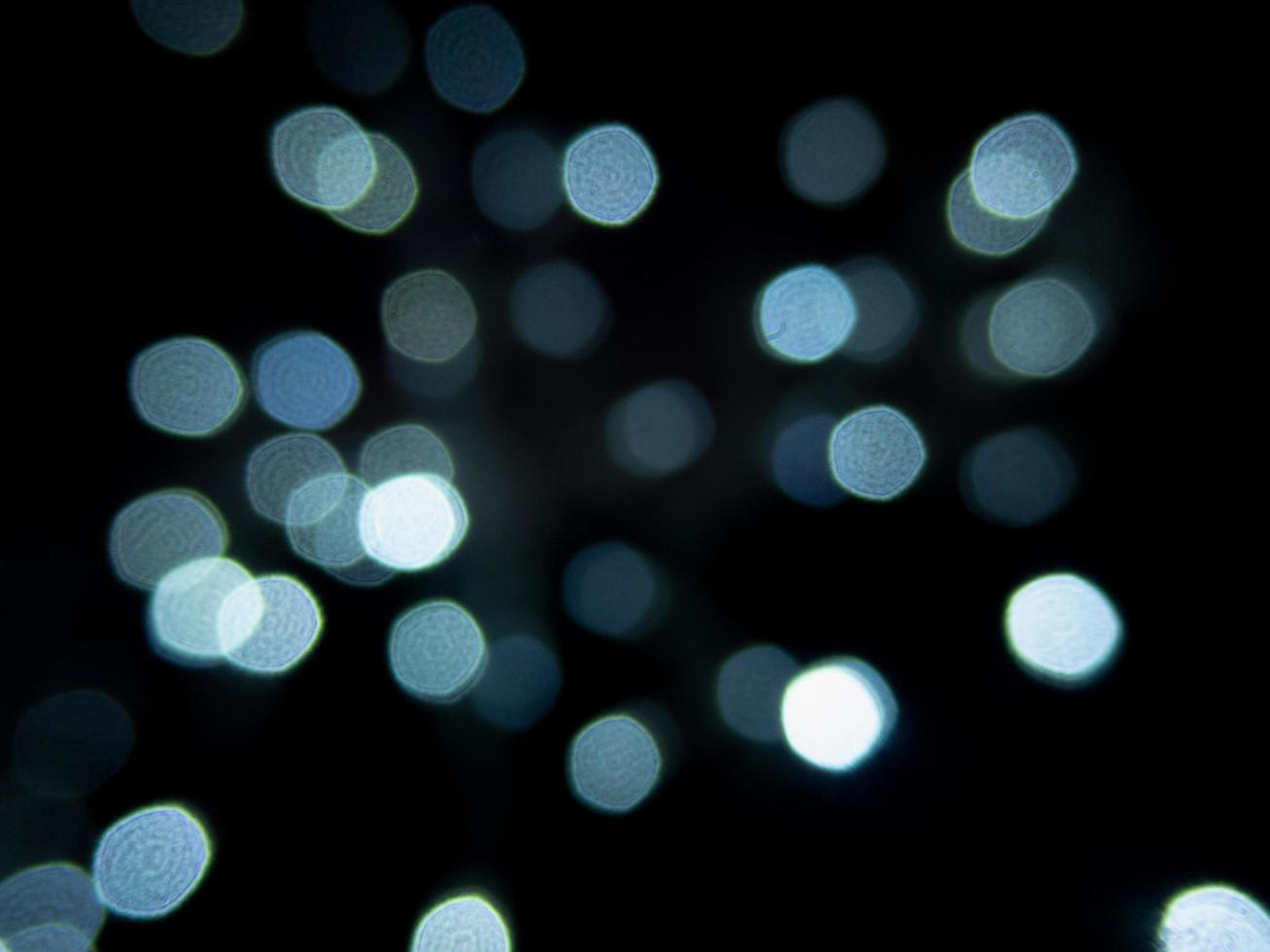 el fondo azul del bokeh brilla en la noche muy hermoso foto