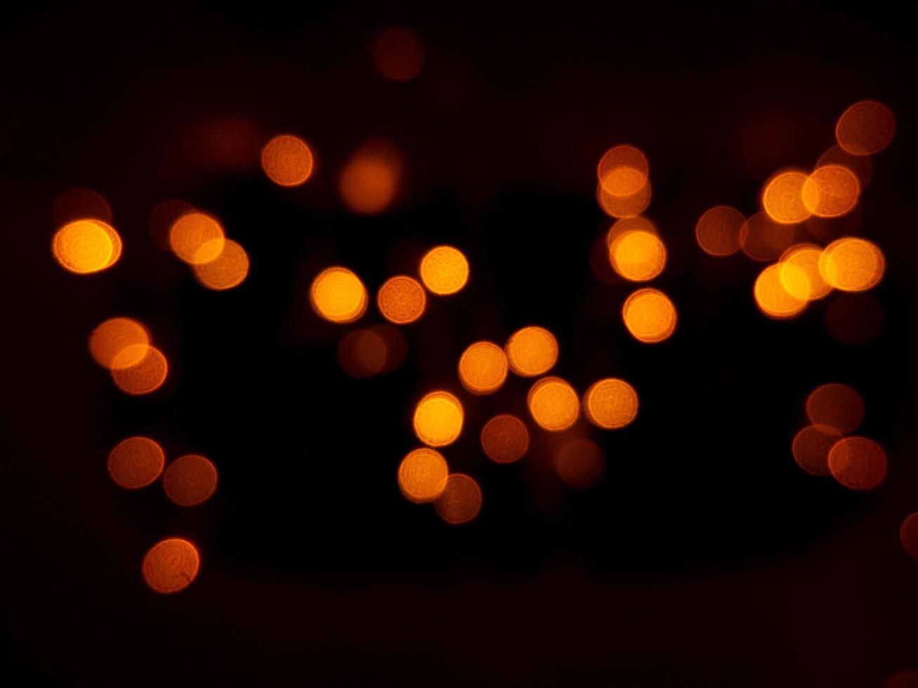 bokeh background is shining golden in the night. photo