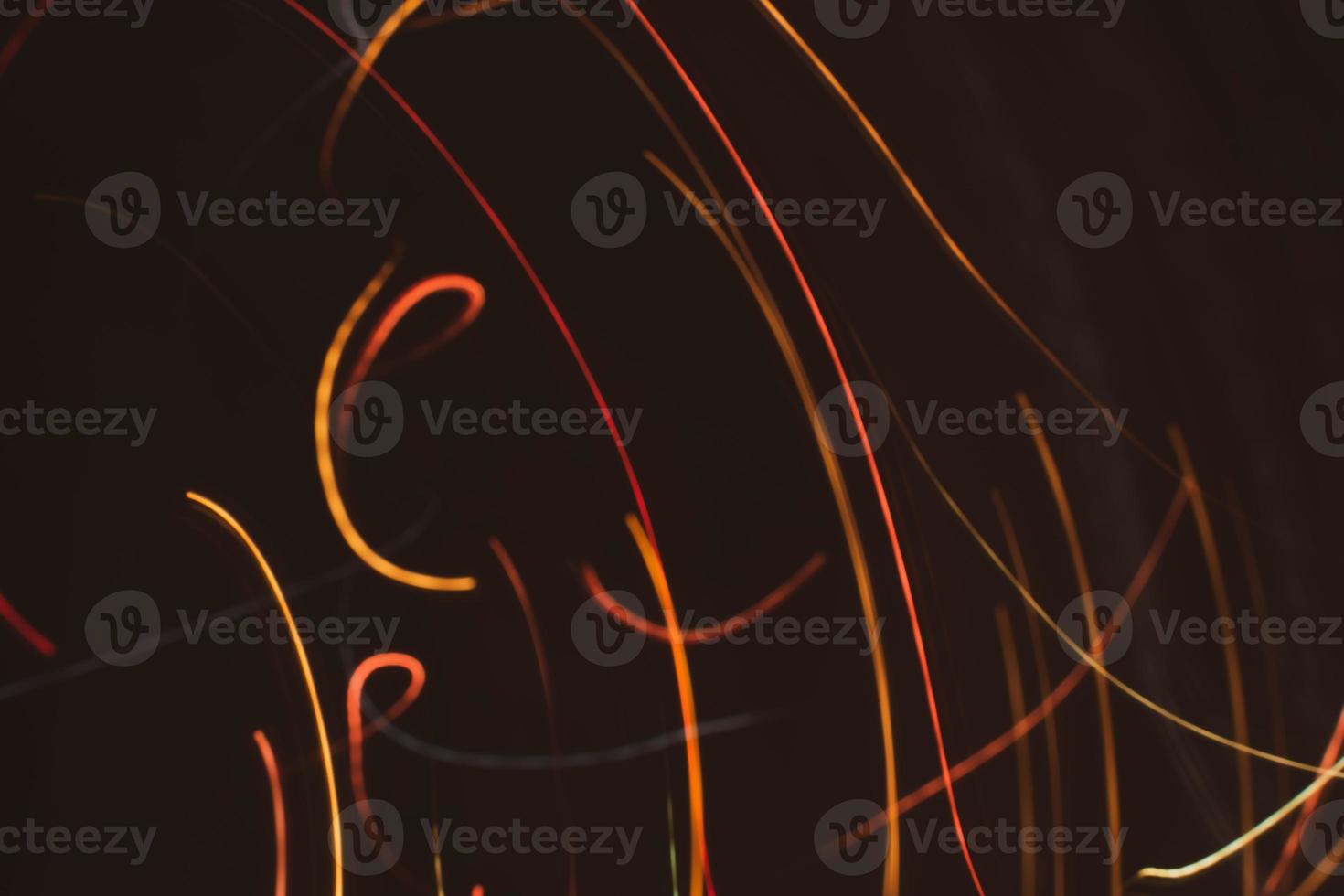 Twisted and diagonal lines on a dark background. Photo effect. Abstract