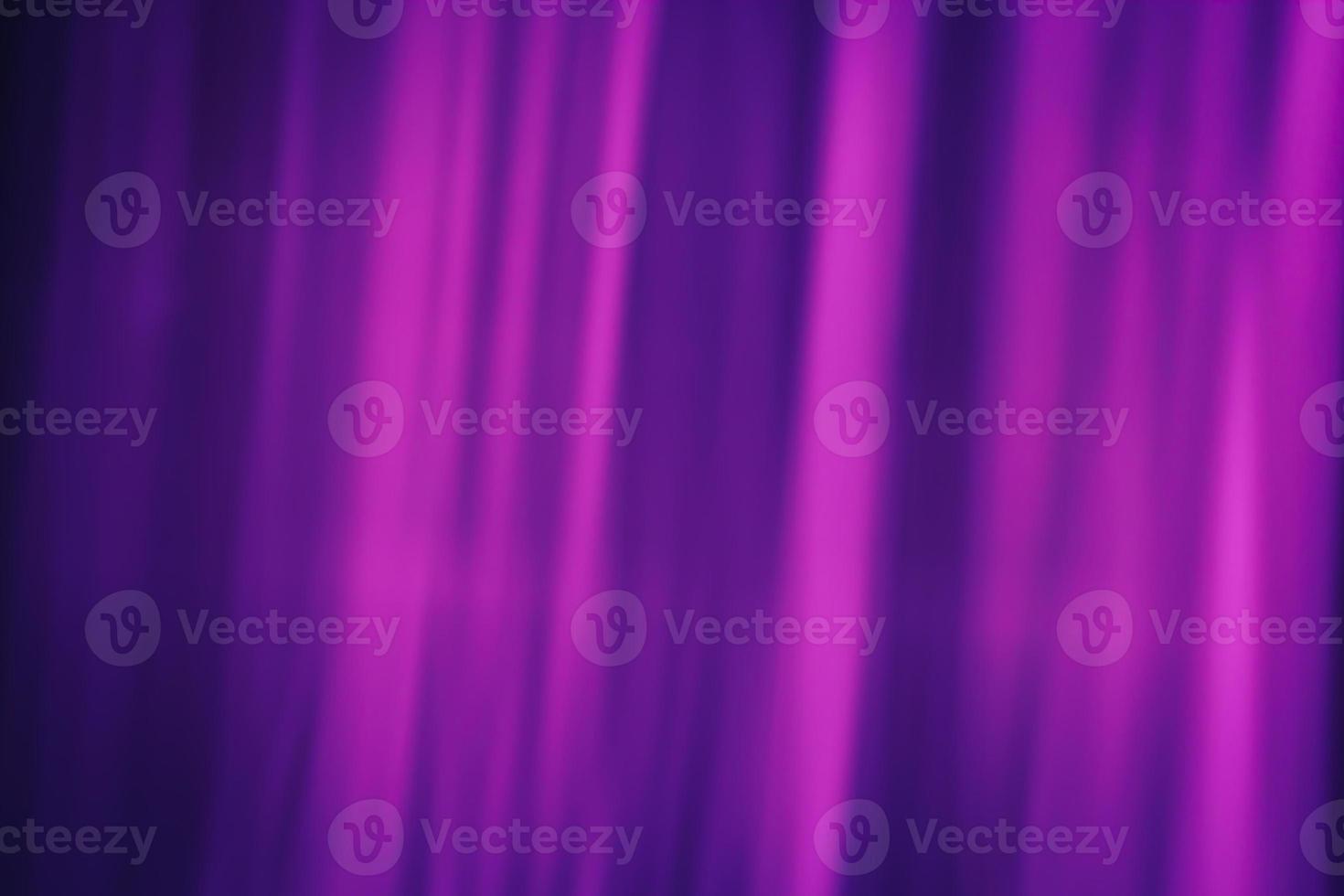 Softly blurred rays of magenta color on a dark purple background. Abstraction curtain. photo