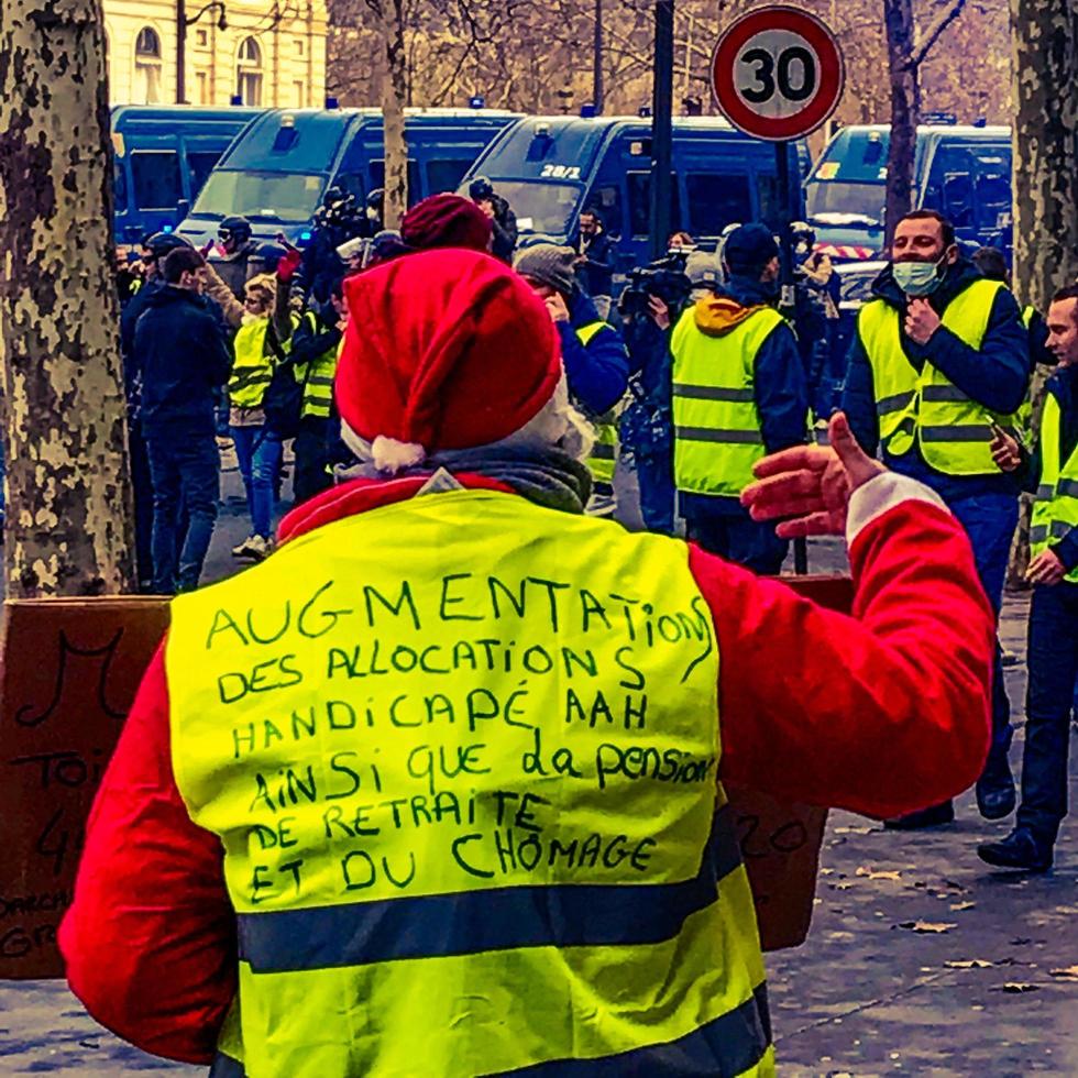 Demonstrators during a protest in yellow vests photo