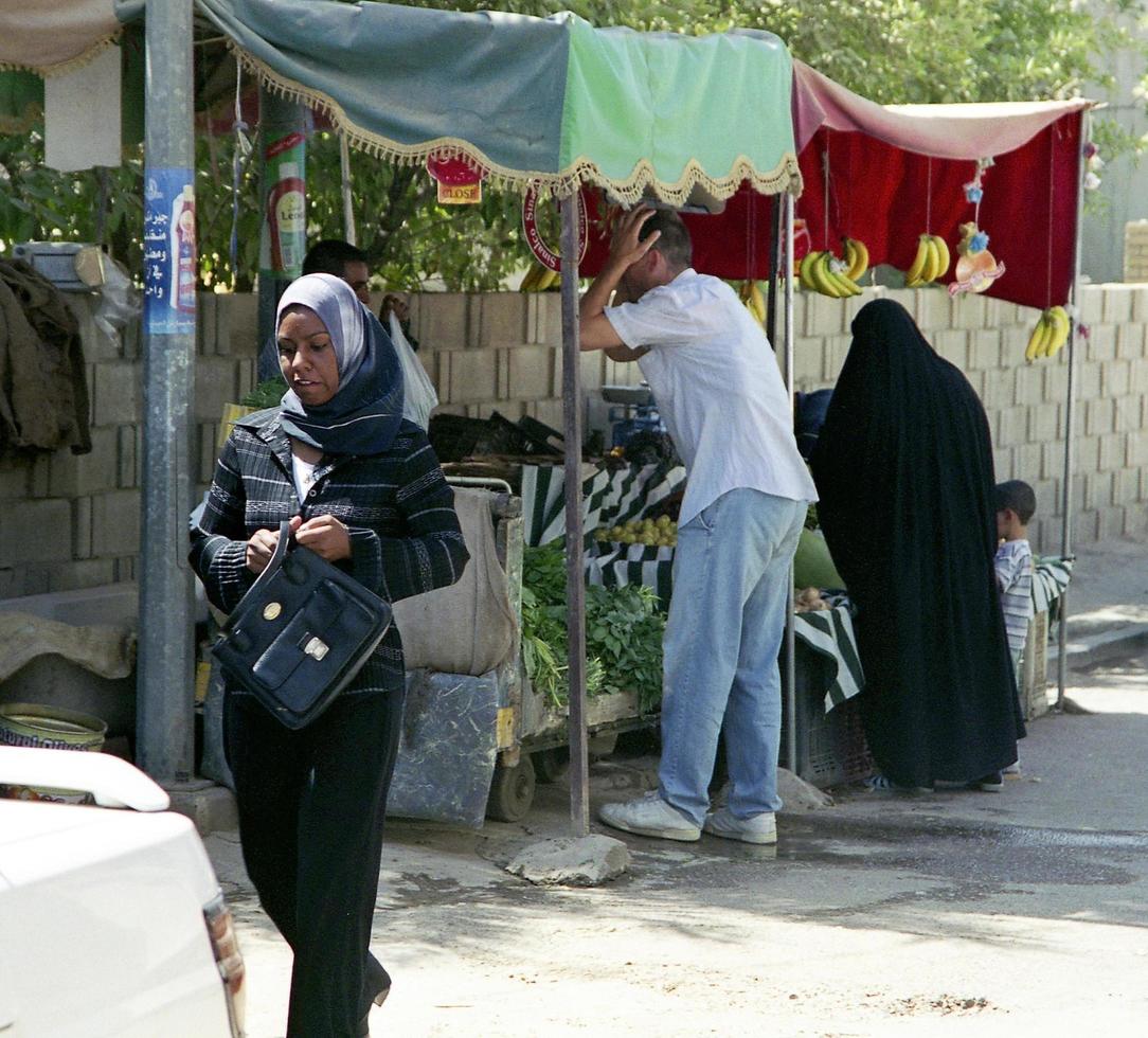 Different muslim people handles personal affairs after conflict with military during curfews photo