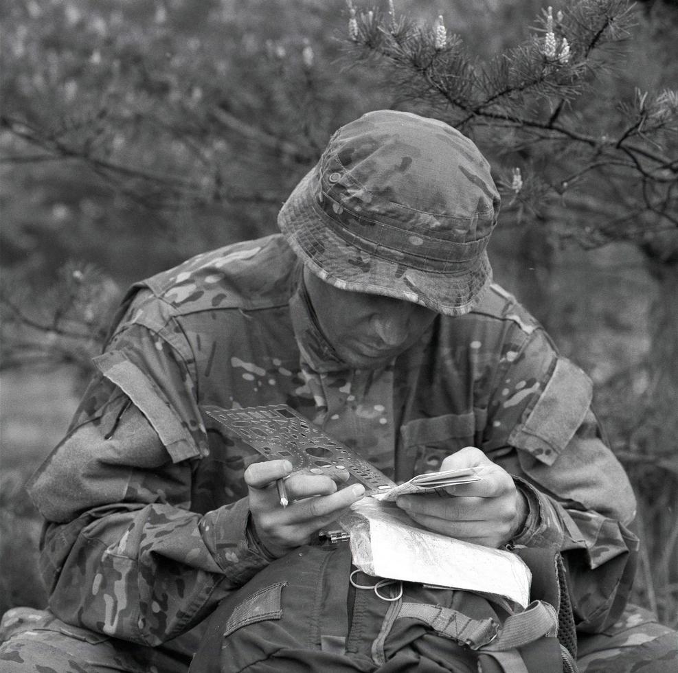 Different soldier people handles personal affairs after conflict photo