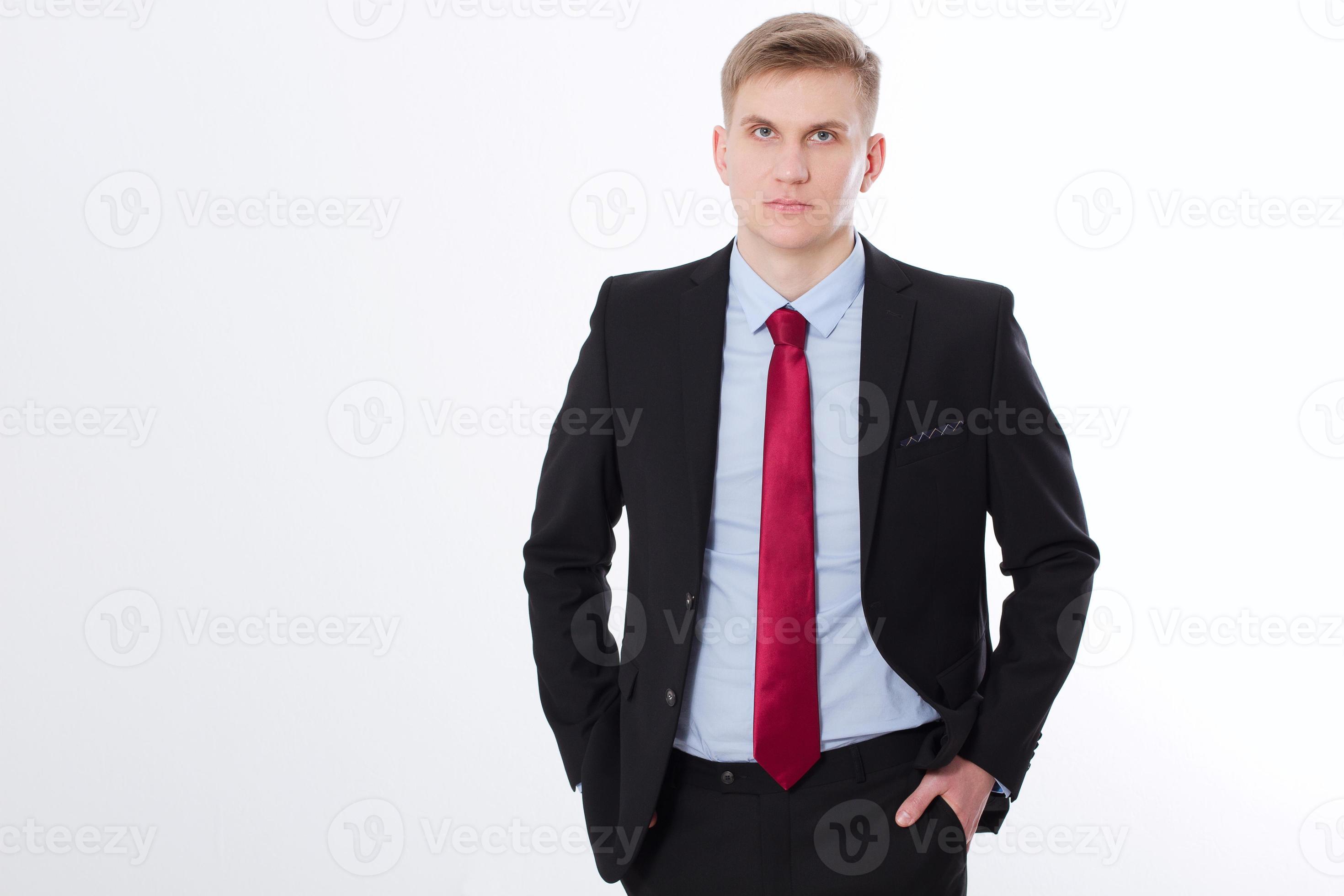 Black man in dark suit, white shirt and red tie, a successful, prosperous  businessman, looking thoughtful Stock Photo - Alamy