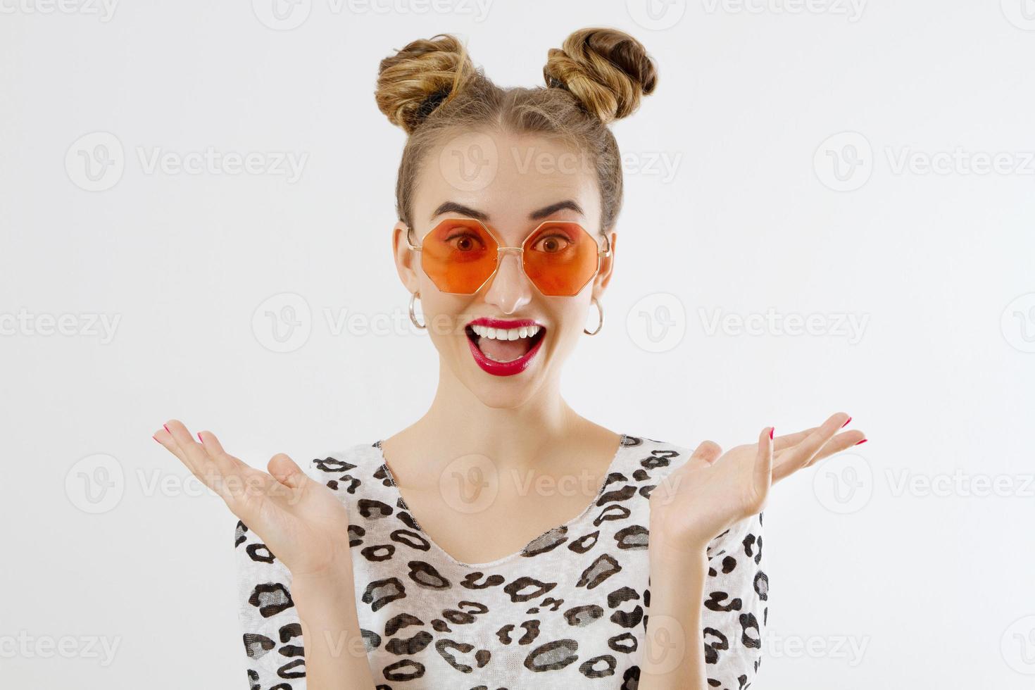 Close-up woman face. Fashion female closeup in trendy clothes isolated on white background. Summer fun time and summertime accessories. Funny girl. photo