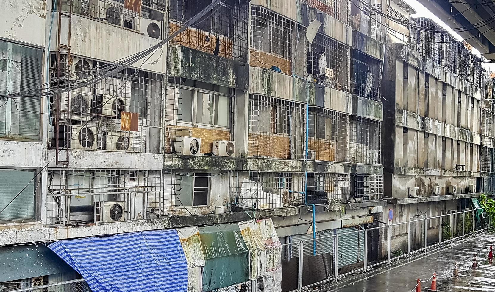 Unsightly run down poor dirty old areas in Bangkok Thailand. photo