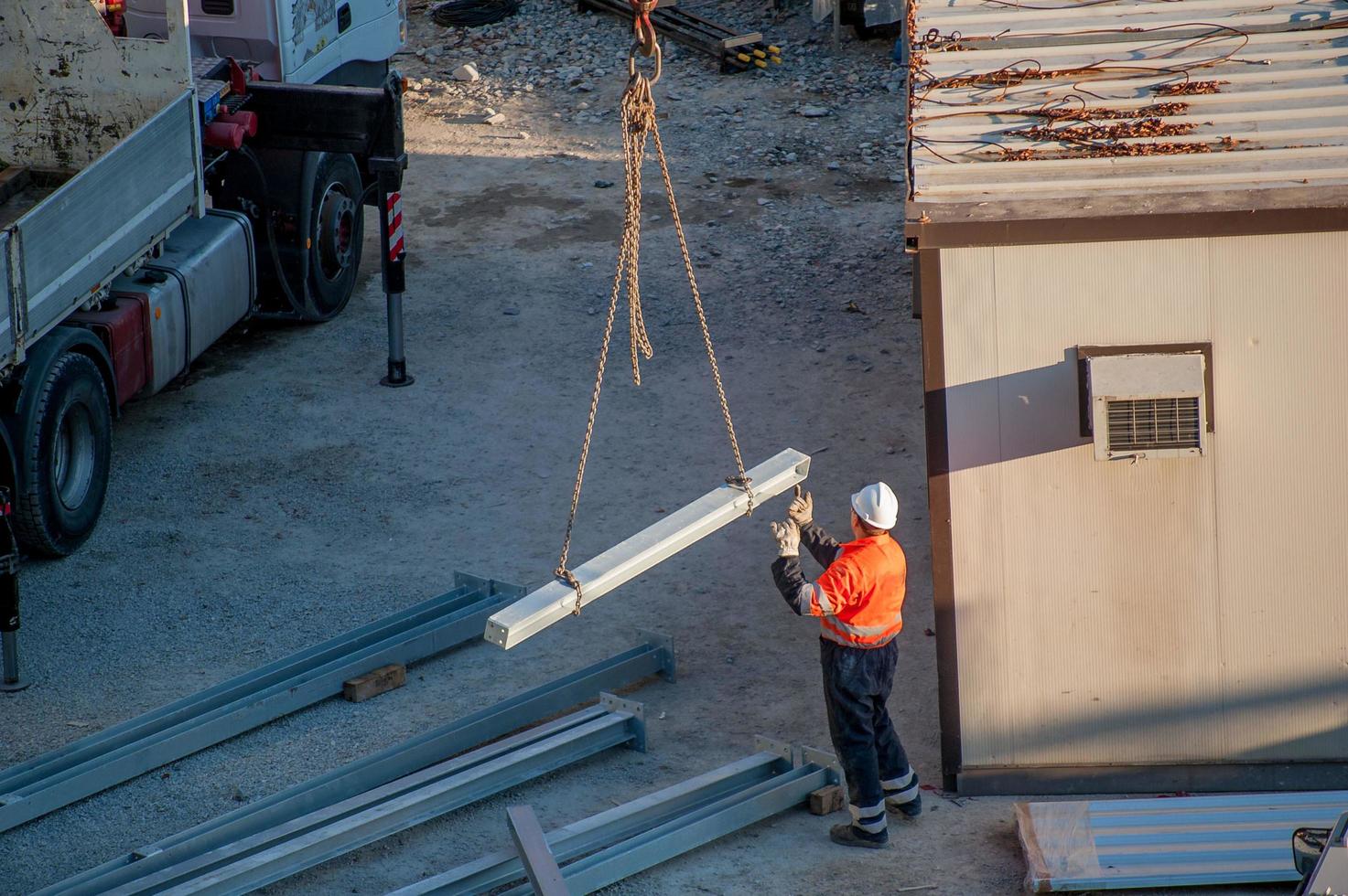 Bergamo, Italy 2013-Laborer working to raise iron bar photo
