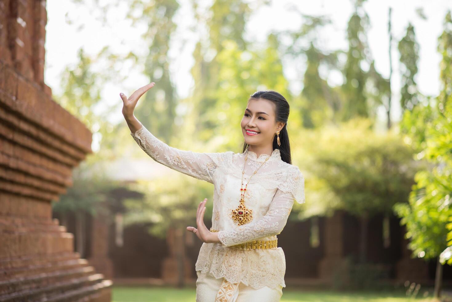 Beautiful Woman wearing typical Thai dress photo