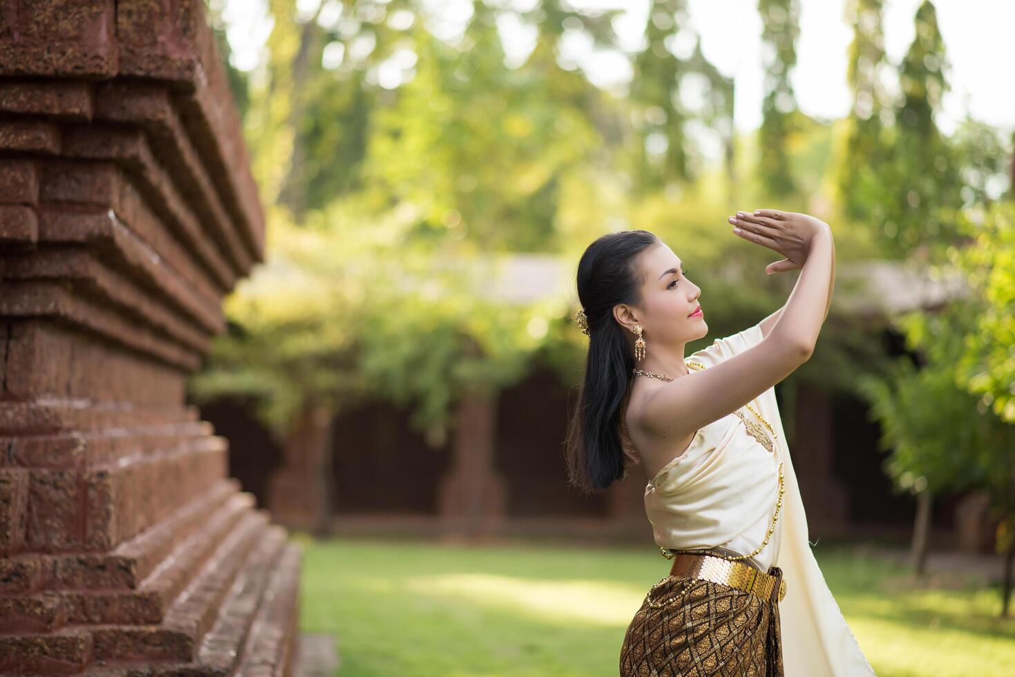 Beautiful Woman wearing typical Thai dress photo