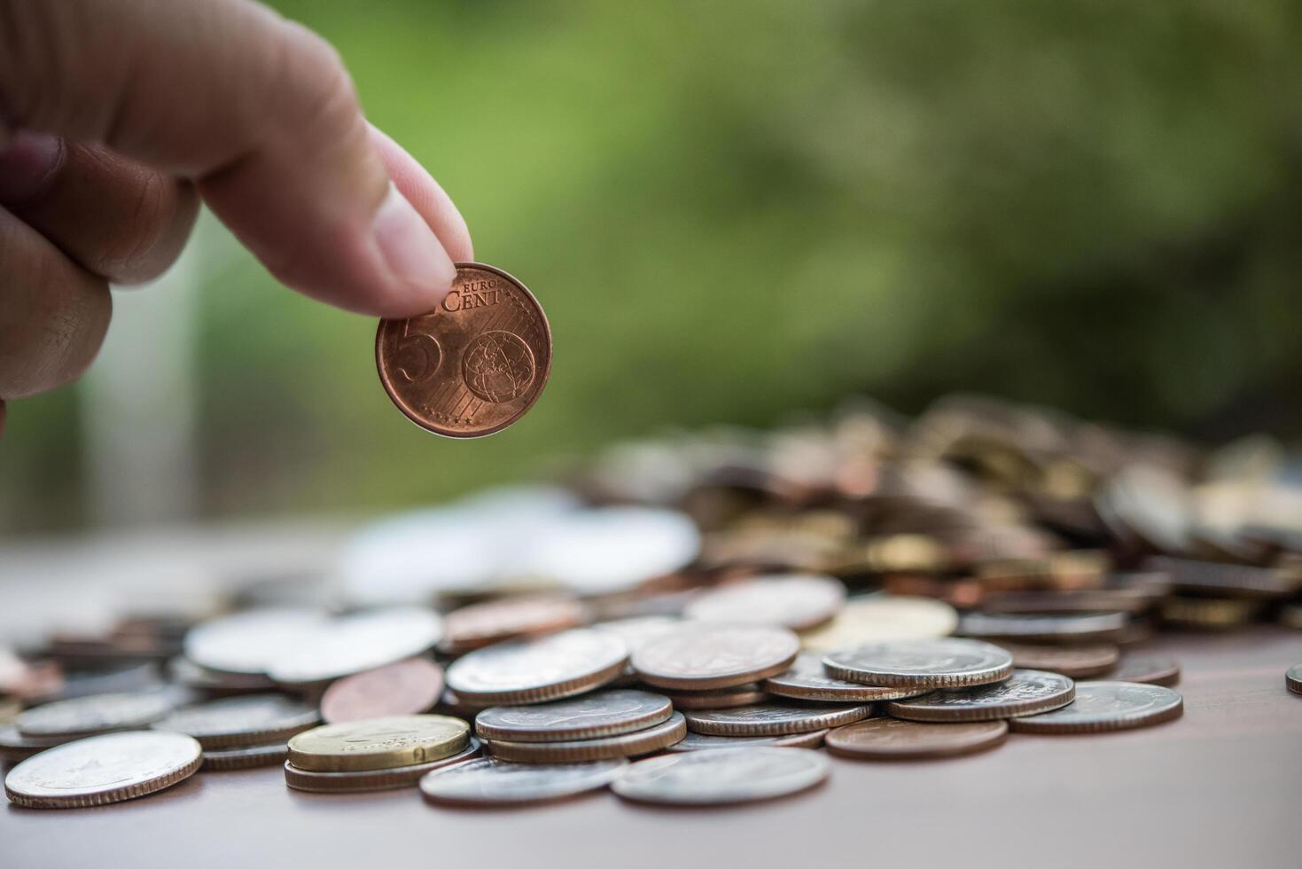 Saving money concept . hand putting money coin stack photo