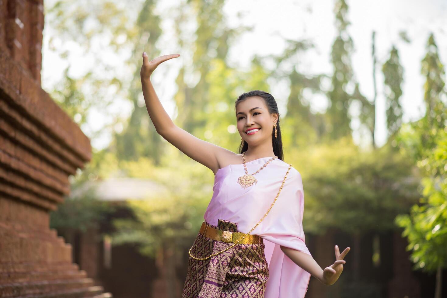 Beautiful Woman wearing typical Thai dress photo