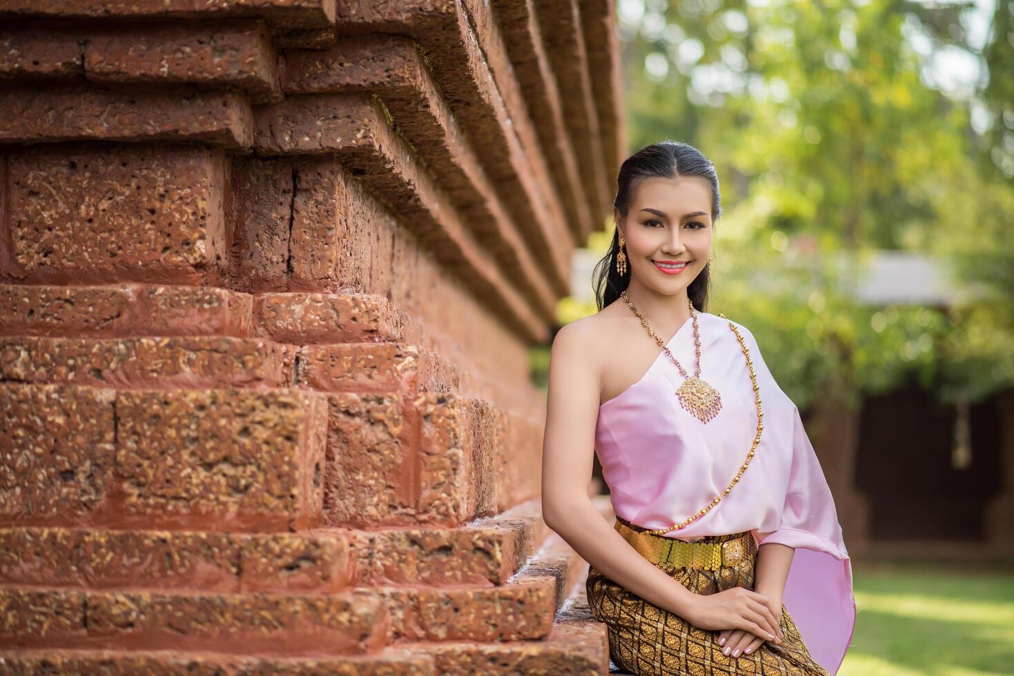 Beautiful Woman wearing typical Thai dress photo
