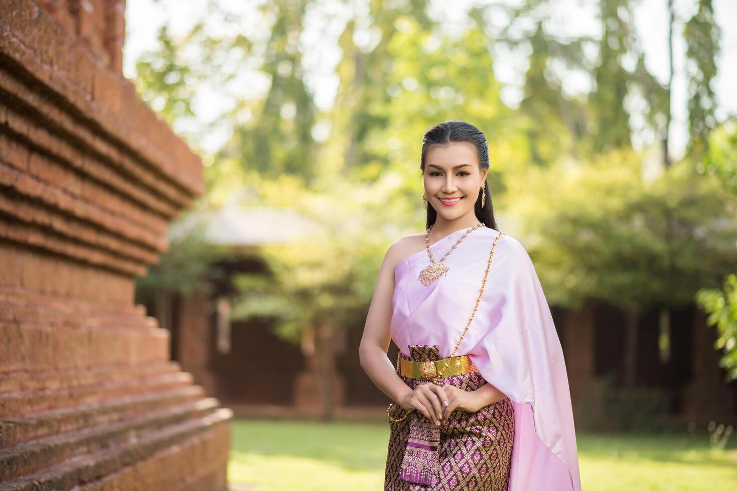 Beautiful Woman wearing typical Thai dress photo