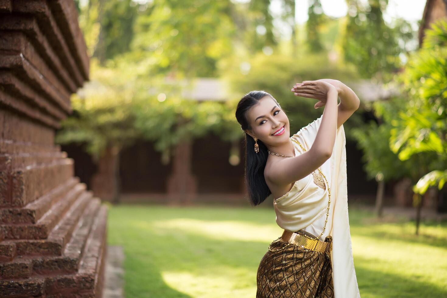 Beautiful Woman wearing typical Thai dress photo