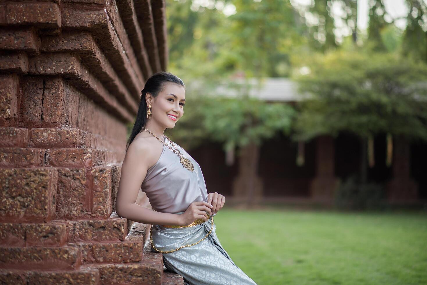 Beautiful Woman wearing typical Thai dress photo