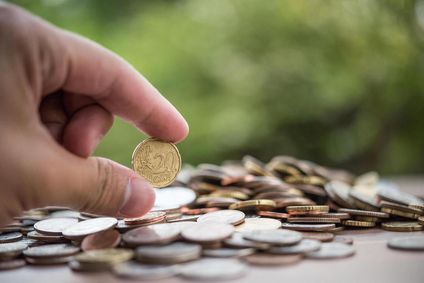 Saving money concept . hand putting money coin stack photo