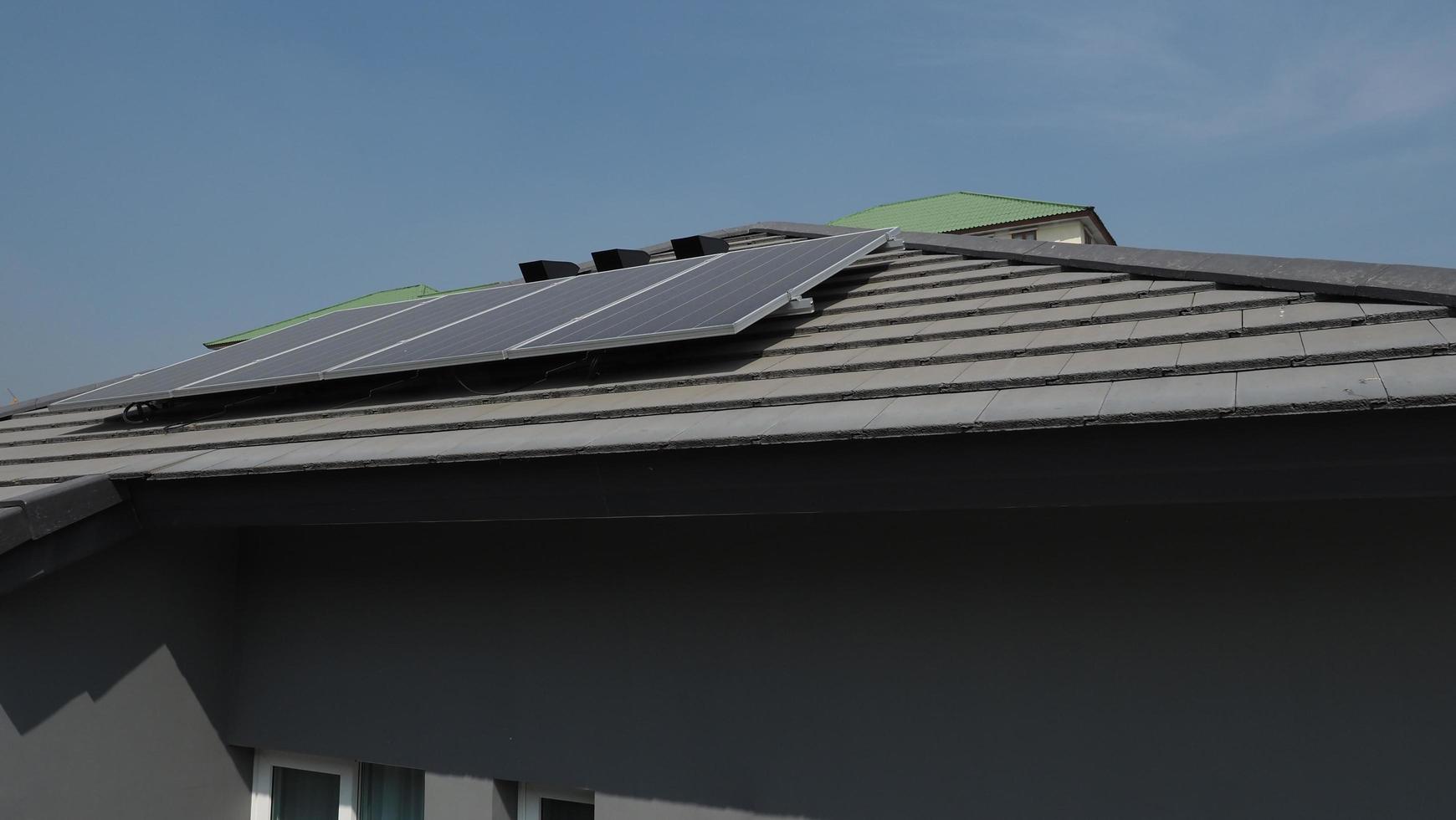 Photovoltaic. Solarcell panel. Solar roof power plant on the roof photo