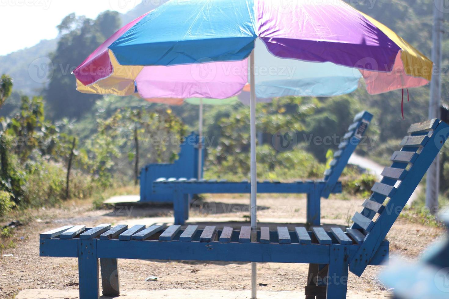 wooden bench on the beach photo