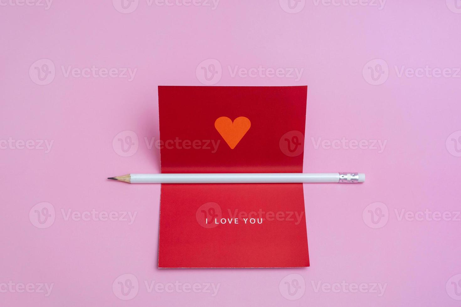 Valentines day greeting mockup with blank card and white pencil. Creative flat lay empty space. photo