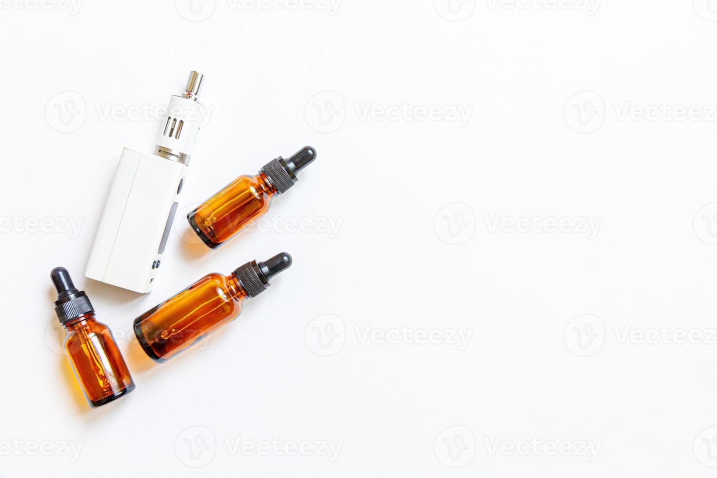 Vaping device e-cigarette electronic cigarette and liquid bottles isolated on white background. Vape device for alternative smoking. Vaping shop concept. Gadget for vaper. Vaping accessories. photo
