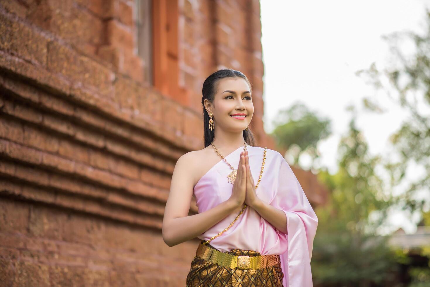 Beautiful Woman wearing typical Thai dress photo